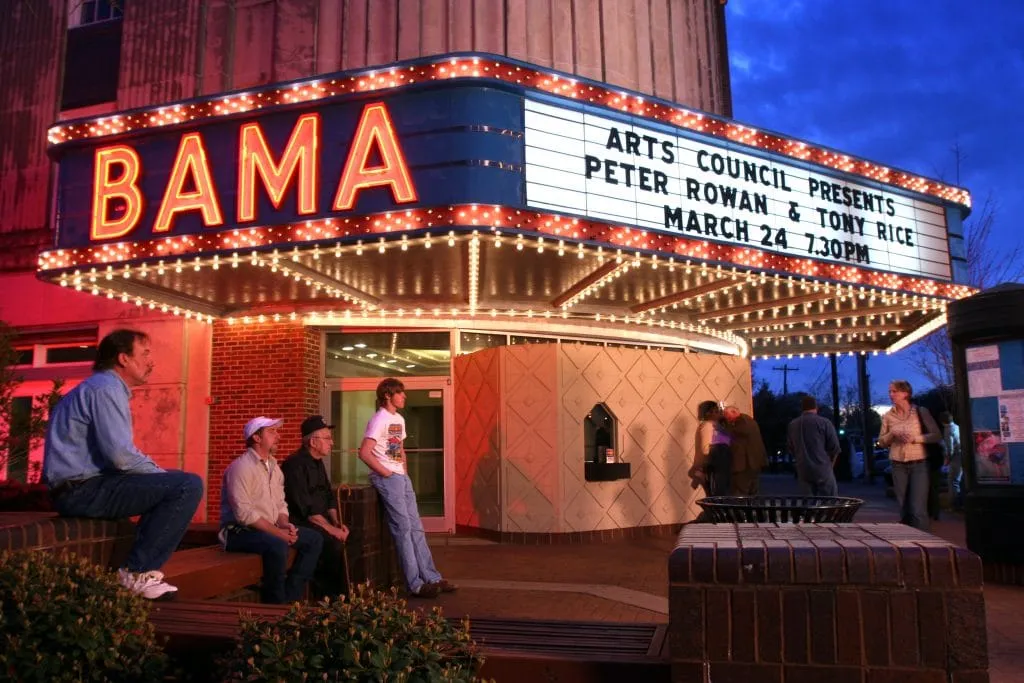 Young student learning violin in educational classroom setting