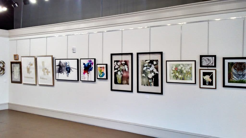 Gallery with white walls displaying art